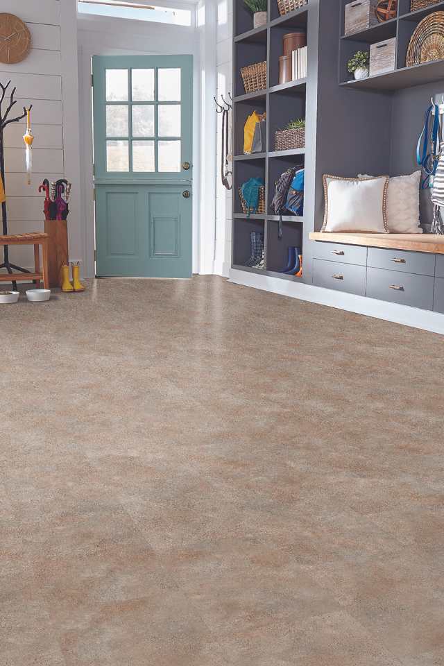 stone look luxury vinyl in contemporary entryway with custom built mudroom bench